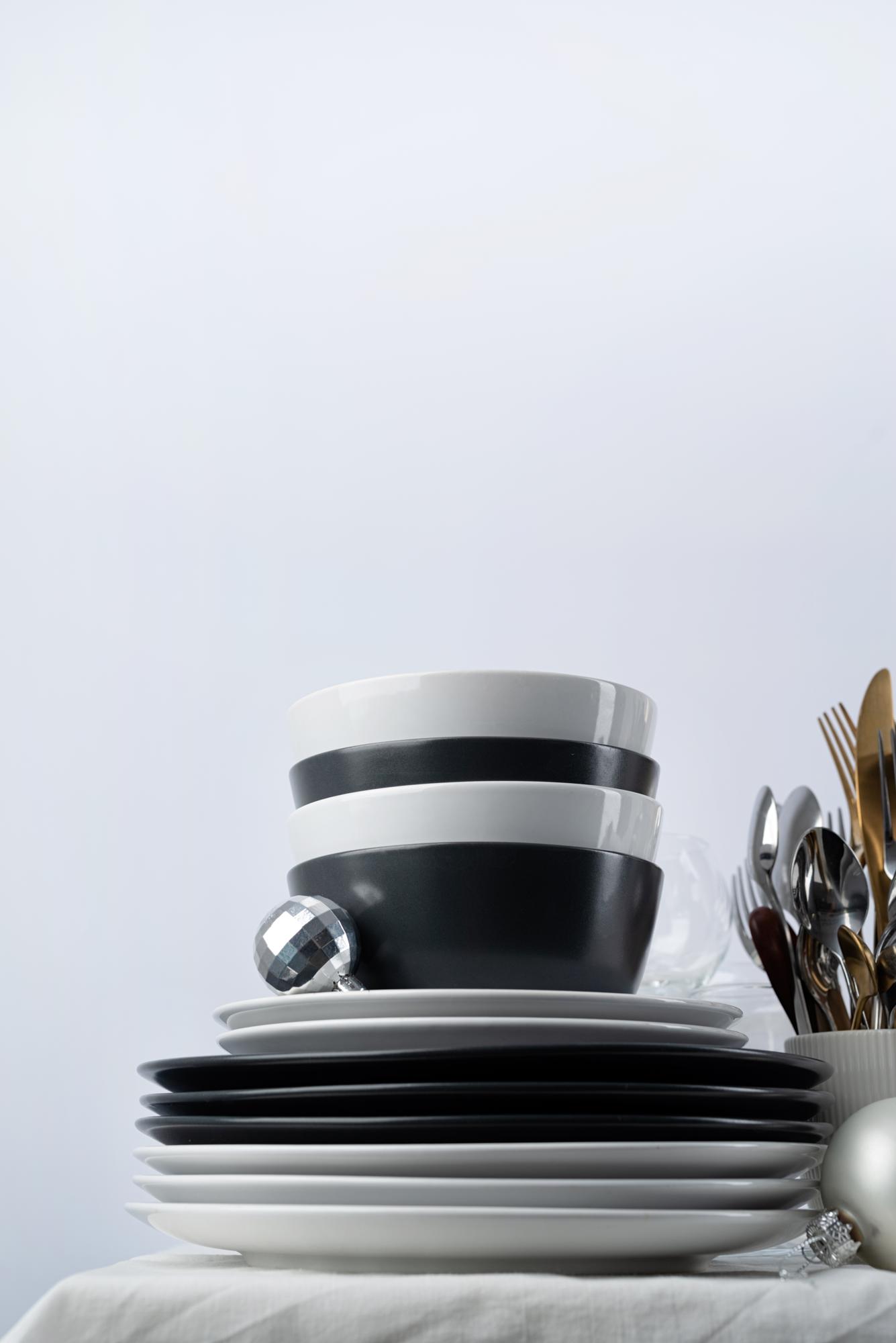 studio kitchen bench with plated dishes and utensils